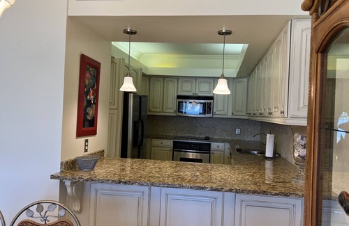 Ono Island Condo | Ground floor condo with walk out access to docks, fishing piers and pool