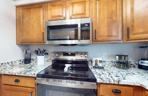 Chandler House | Ground-floor condo with on-site pool, pickleball, hot tub, gym & private balcony