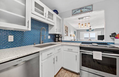 New Smyrna Beach Condo | Ground-floor direct oceanfront condo with a patio and multiple beachfront pools