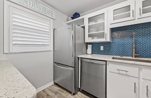 New Smyrna Beach Condo | Ground-floor direct oceanfront condo with a patio and multiple beachfront pools