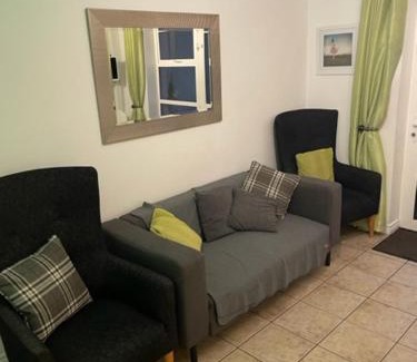 Drumacrin Apartment | Ground Floor Deluxe Seaside Apartment With Patio & Private Entrance, marine court