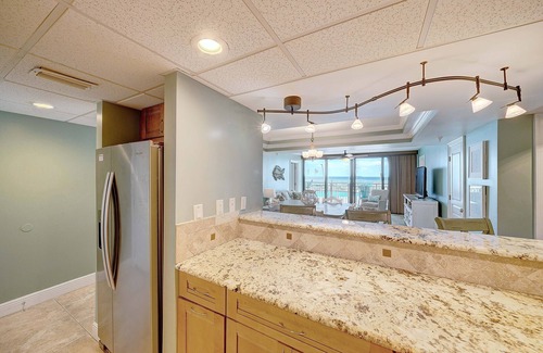 Biltmore Beach Condo | GROUND FLOOR UNIT! 3br/3b with TWO masters! Pool accessible from private patio!