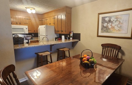 Gatlinburg Condo | Ground Level Unit | 2BR |4 Mins to OBER w/Fireplace, * Dinner Show Tickets, Pool, Hot Tub, Sauna
