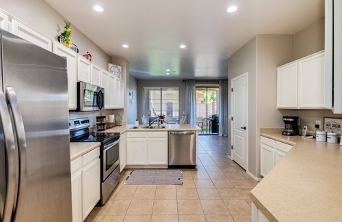Sunrise Village House | Group Luxury Retreat ~ 4 Neighboring Homes, 21 Beds, Pool & Golf Community