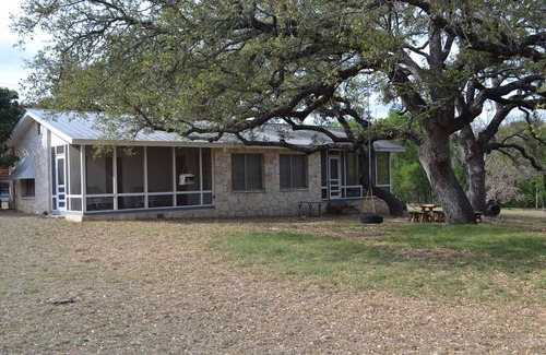 Hunt House | Guadalupe riverfront wooded Hill Country acreage located in Downtown Hunt, TX