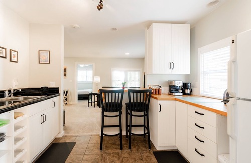 Traverse City House | Guest House on Old Mission, Pure Sand Beach, Sunset, Wineries, A Couple Respite.
