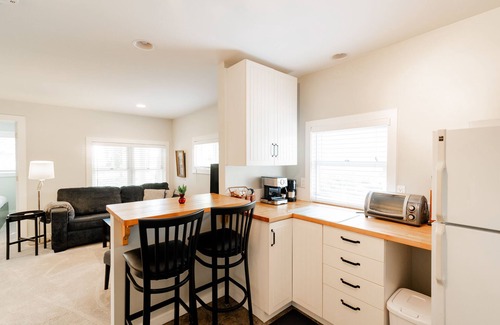 Traverse City House | Guest House on Old Mission, Pure Sand Beach, Sunset, Wineries, A Couple Respite.
