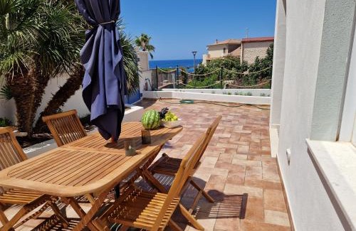 Portoscuso Apartment | Guest House Sunset on the sea