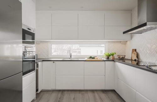 Lovholmen Villa | Guestly Homes - Modern 4BR Villa with Sauna