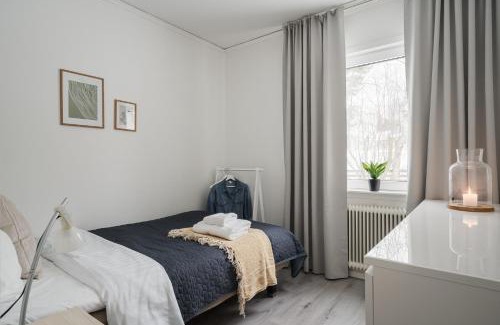 Lovholmen Villa | Guestly Homes - Modern 4BR Villa with Sauna
