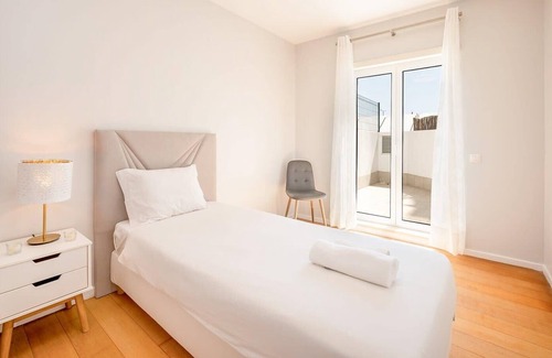Sao Domingos de Benfica Apartment | GuestReady - Contemporary white in Lisbon