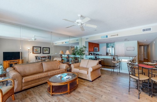 West Panama City Beach Condo | Gulf-facing condo with pool, scenic balcony, beach service & beach access