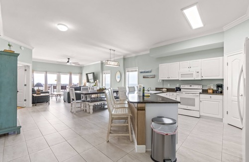 Gulf Shores Condo | Gulf-front condo with balcony overlooking beach, pool, new furniture, & W/D