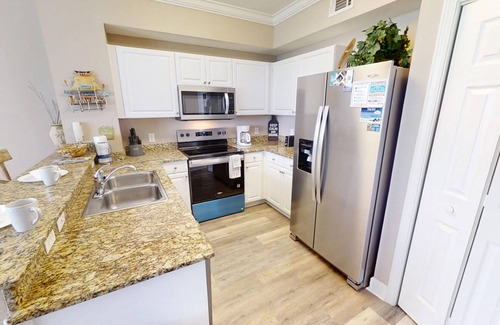 Panama City Beach Condo | Gulf Front Free Beach Service Free round of Golf & Activities Every Day