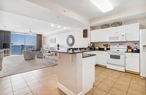 Panama City Beach Condo | Gulf front primary with king bed. Pools, hot tub, arcade and more!