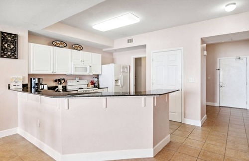 Panama City Beach Condo | Gulf front primary with king bed. Pools, hot tub, arcade and more!