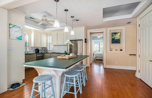 Beachside Village House | Gulf-view home with three balconies - walk to beach - central AC & private W/D