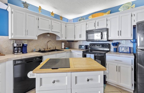 Gulf Shores Condo | Gulf Village unit 217 Corner unit with Wrap around balcony!