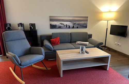 Wremen Apartment | Hübsche, Strandnahe Ferienwohnung mit Eigener Sauna und Terrasse mit Strandkorb