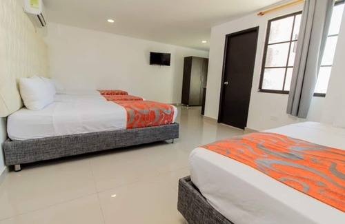 El Prado Hotel | Habitacion Delux Cuadruple Cerca Al Malecón Turístico Río Magdalena Barranquilla