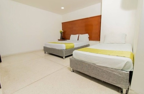 El Prado Hotel | Habitacion Deluxe Triple Cerca Al Malecón Turístico Río Magdalena Barranquilla