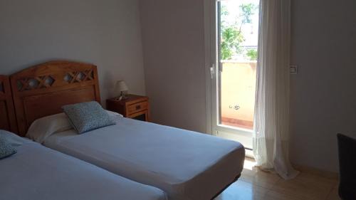 Aguadulce House | Habitaciones Jacaranda