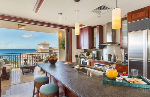 Ko Olina Condo | Hale Pumehana O-1202 stunning views and comfort