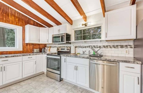 East Quogue House | Hamptons renovated 1840 farm house w/heated pool