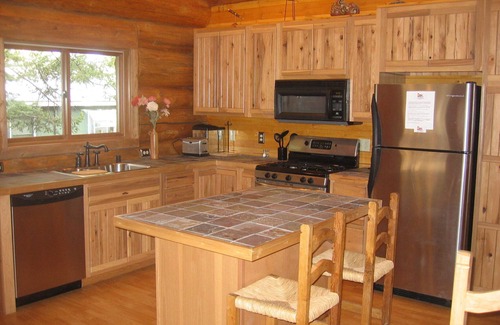Cloudcroft Cabin | Handcrafted Log Home with hot tub backing into National Forest