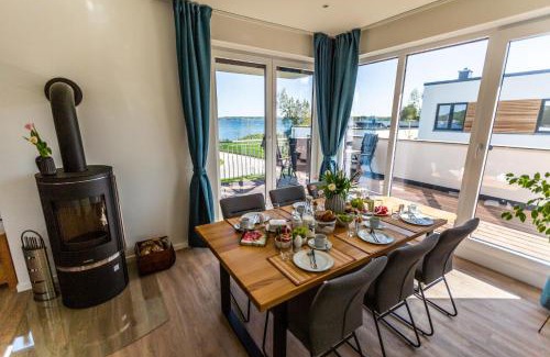 Schwerin Apartment | Hangar 19 Luxusapartment mit Sauna, Kamin und Seeblick H4W3