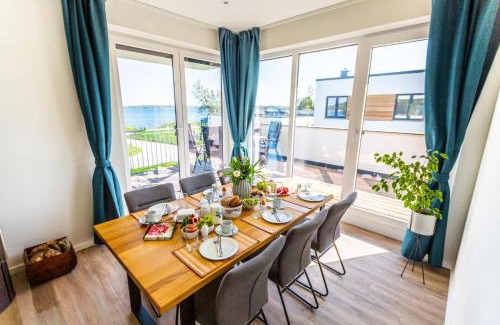 Schwerin Apartment | Hangar 19 Luxusapartment mit Sauna, Kamin und Seeblick H4W3