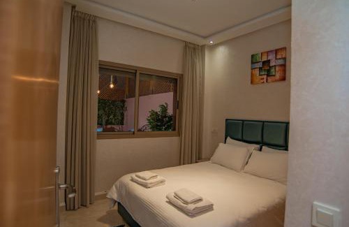 El Hara Apartment | Hanna Modern - Patio & BBQ - Wifi - Center - AC