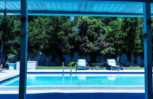 Woodlawn Villa | Happy OURS Pool Home Escape