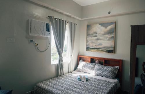 Trece Martires Apartment | Happy Stays D - 300mbps - 65"TV NetFlix, Disney - Washer
