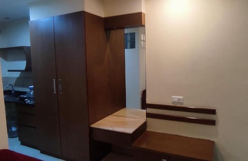Gokulam Apartment | Happy Vibes studio flats - service apartment