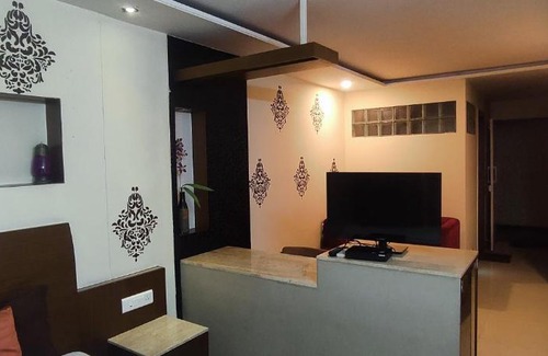 Gokulam Apartment | Happy Vibes studio flats - service apartment