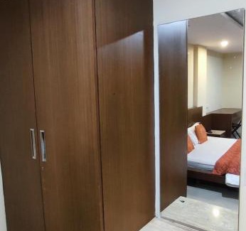 Gokulam Apartment | Happy Vibes studio flats - service apartment