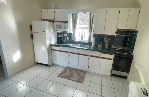 Mount Pleasant Bay Apartment | Harbourview Apartments – Where Breathtaking Views Meet Island Comfort.