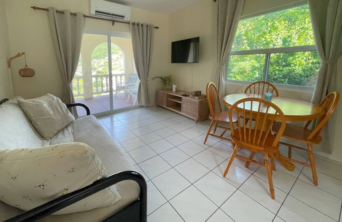 Mount Pleasant Bay Apartment | Harbourview Apartments – Where Breathtaking Views Meet Island Comfort.