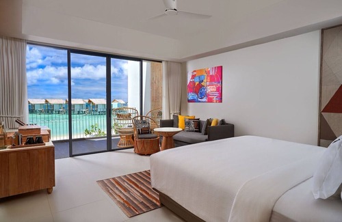 Farukolhufushi Island Hotel | Hard Rock Maldives – Silver Sky Studio with Lagoon View Balcony