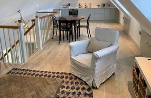 Rendcomb Cottage | Hare's Lodge, a modern cosy Cotswolds retreat with lovely views