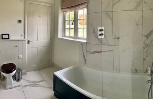 Rendcomb Cottage | Hare's Lodge, a modern cosy Cotswolds retreat with lovely views