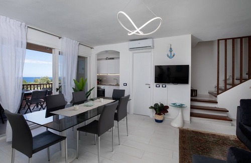 Portisco Apartment | Harenae Beach Gataway by Wonderful Italy