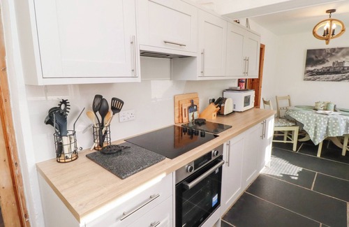 Seahouses Cottage | HARES FORM, pet friendly, with open fire in Seahouses