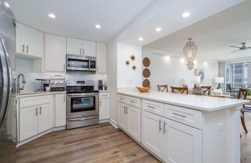 Vanderbilt Beach Condo | HARMONY- Renovated Top Floor Condo, Gulf Views, Only 300 steps to beach!