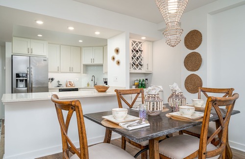Vanderbilt Beach Condo | HARMONY- Renovated Top Floor Condo, Gulf Views, Only 300 steps to beach!