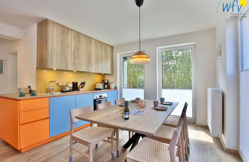 Wangerooge Apartment | Haus am Dorfbrunnen Ferienwohnung Welle