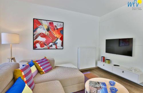 Wangerooge Apartment | Haus am Dorfbrunnen Ferienwohnung Welle
