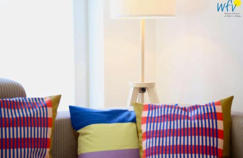 Wangerooge Apartment | Haus am Dorfbrunnen Ferienwohnung Welle