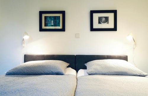 Stadtmitte Apartment | Haus im Grünen für 6 Personen-3 Schlafzimmer- 3 Bädern -Waschmaschine-große Terrasse- vollausgestattete Küche